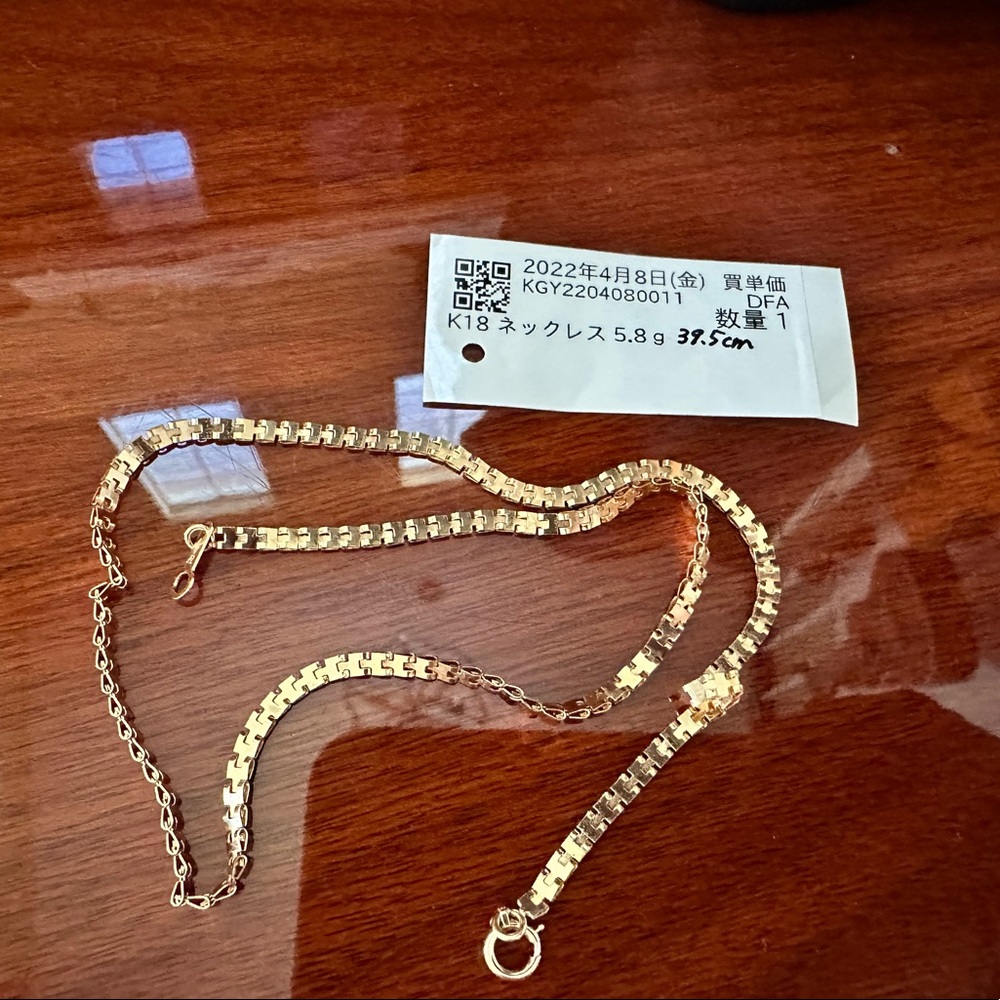 18K Unique Rolex type necklace.
